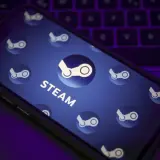 Telefon z logo Steam na ekranie, przygotowany na promocje Steam, kiedy startuje Summer i Winter Sale.