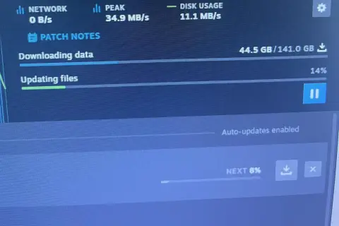 Sieć pobiera dane z prędkością 0 B/s, co może być powodem, dlaczego Steam wolno pobiera. Dysk jest obciążony w 11.1 MB/s.